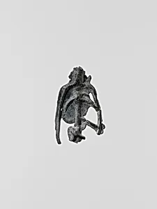 Lead figure, possibly of a skeleton