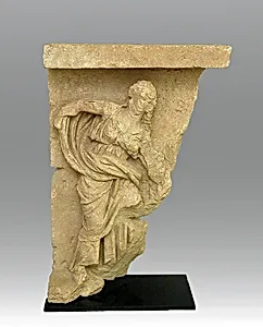 Limestone relief with the figure of a woman