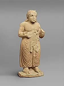 Limestone statue of a god