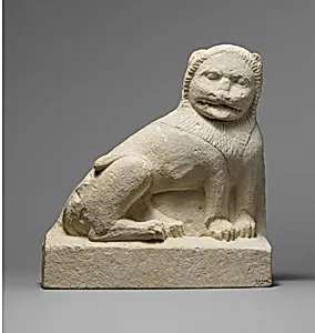 Limestone statue of a seated lion