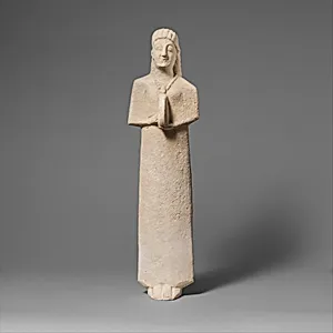 Limestone statuette of a female votary (worshipper) playing a tambourine