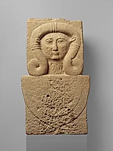 Limestone stele (shaft) with the head of Hathor by Unknown Artist