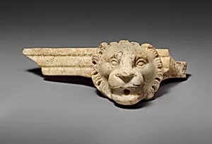 Marble fragment of a fountain with lion's head
