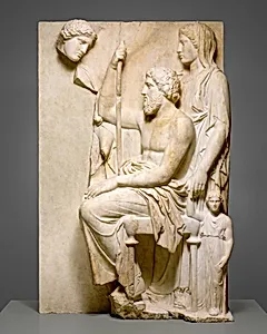 Marble grave stele with a family group