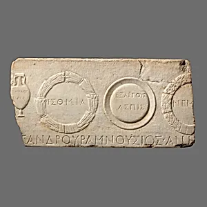 Marble relief fragment depicting athletic prizes