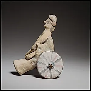 Model of a cart with a human figure by Unknown Artist