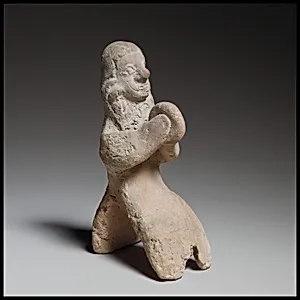 Seated female tambourine player
