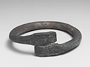 Silver bracelet ending in snake's heads