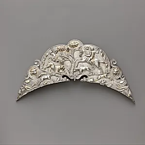 Silver handle of a large dish