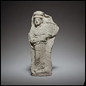Standing female kithara player
