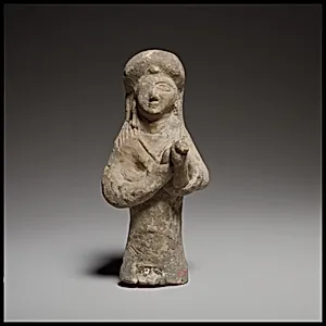 Standing female lyre player