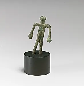 Statuette of a woman ? by Unknown Artist