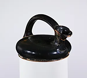 Terracotta askos (flask with a spout and handle over the top)