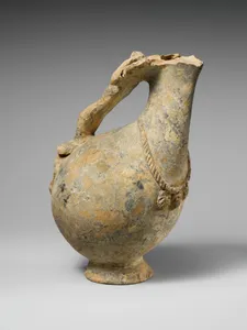 Terracotta askos (flask with a spout and handle over the top)