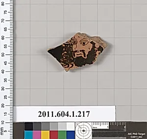 Terracotta fragment of a kylix (drinking cup)