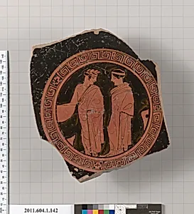 Terracotta fragment of a kylix (drinking cup)