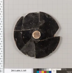 Terracotta fragment of a kylix (drinking cup)