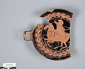 Terracotta fragment of a kylix (drinking cup)