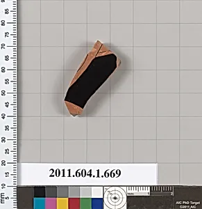 Terracotta fragment of a kylix (drinking cup)