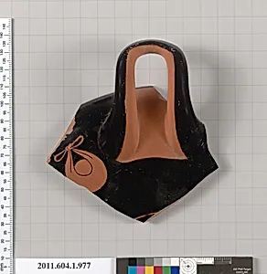 Terracotta fragment of a kylix (drinking cup)