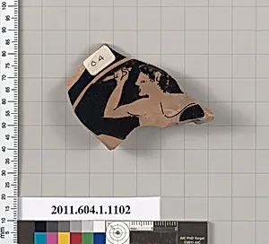 Terracotta fragment of a kylix (drinking cup)