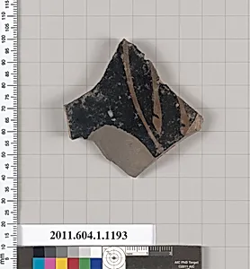 Terracotta fragment of a kylix (drinking cup)