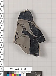 Terracotta fragment of a kylix (drinking cup)