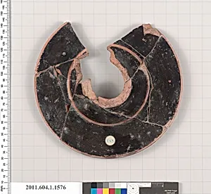 Terracotta fragment of a kylix (drinking cup)
