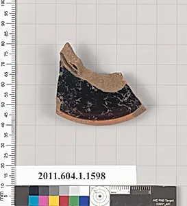 Terracotta fragment of a kylix (drinking cup)