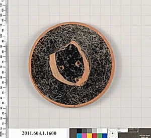 Terracotta fragment of a kylix (drinking cup)