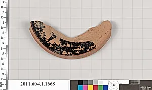 Terracotta fragment of a kylix (drinking cup)