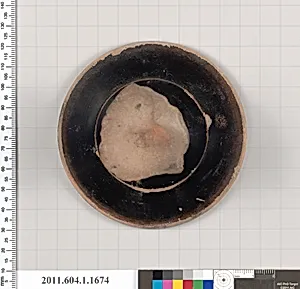 Terracotta fragment of a kylix (drinking cup)