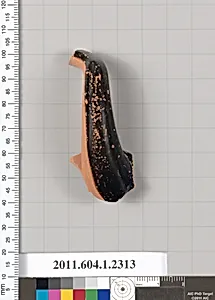Terracotta fragment of a kylix (drinking cup)