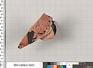 Terracotta fragment of a kylix (drinking cup)