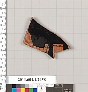 Terracotta fragment of a kylix (drinking cup)
