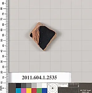 Terracotta fragment of a kylix (drinking cup)
