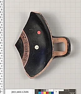 Terracotta fragment of a kylix (drinking cup)