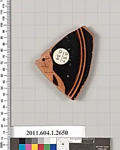 Terracotta fragment of a kylix (drinking cup)