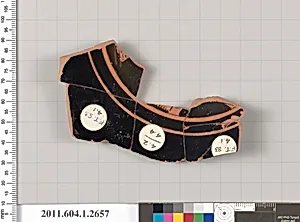 Terracotta fragment of a kylix (drinking cup)