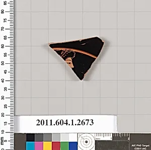 Terracotta fragment of a kylix (drinking cup)