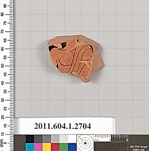 Terracotta fragment of a kylix (drinking cup)