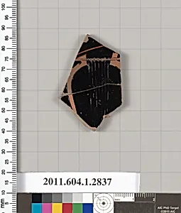 Terracotta fragment of a kylix (drinking cup)