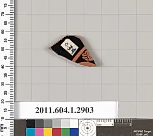 Terracotta fragment of a kylix (drinking cup)