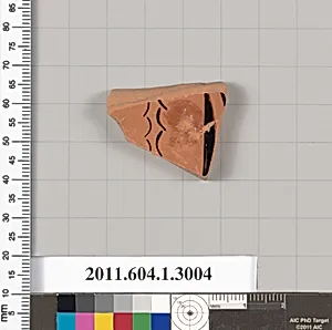 Terracotta fragment of a kylix (drinking cup)