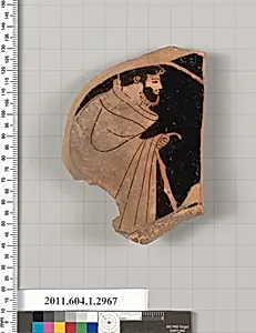 Terracotta fragment of a kylix (drinking cup)