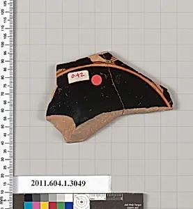Terracotta fragment of a kylix (drinking cup)