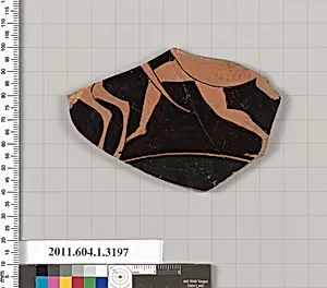 Terracotta fragment of a kylix (drinking cup)
