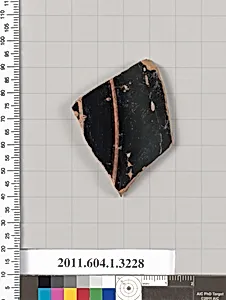 Terracotta fragment of a kylix (drinking cup)