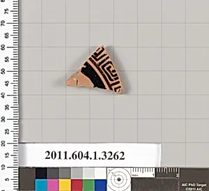 Terracotta fragment of a kylix (drinking cup)