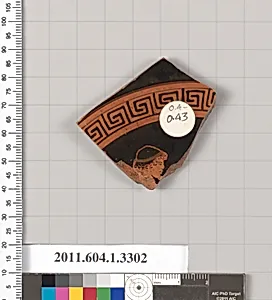 Terracotta fragment of a kylix (drinking cup)